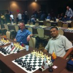 Francisco Baltier (left) and Troy Oberg, representing Arizona on Boards 1 and 3 in the Under 1600 section of the 2011 Western States Open in Reno, Nevada